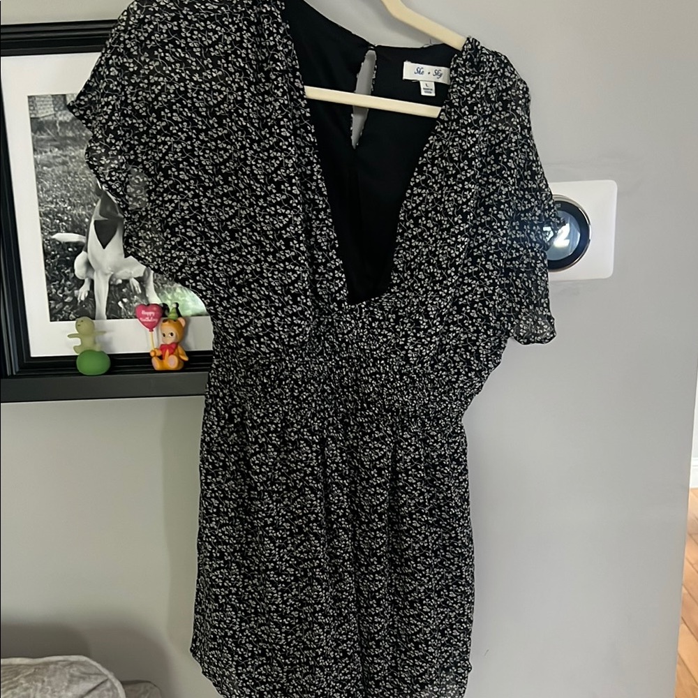 She + Sky Romper Black and White Plunge Neck Flutter Sleeve